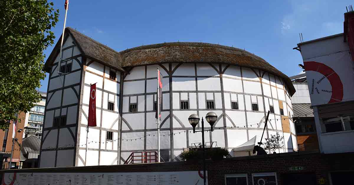 Circular black and white timber framed exterior