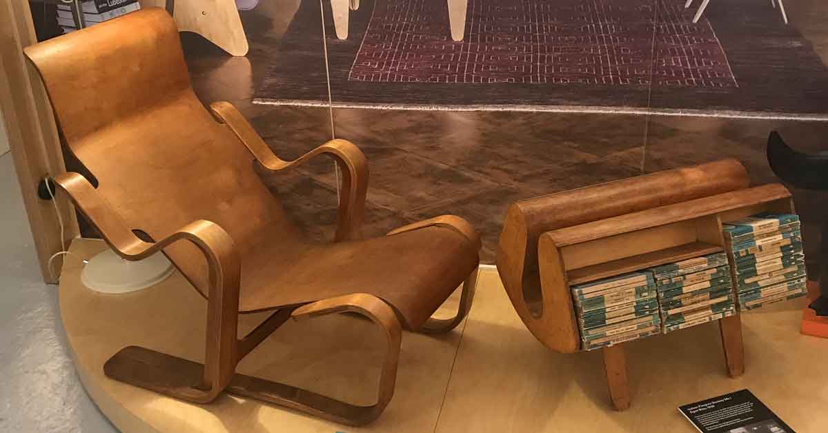 Modernist chair and magazine rack.