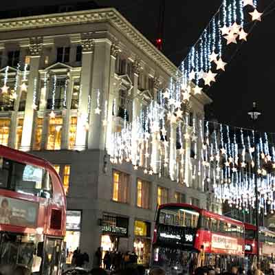 Christmas lights, London Buses and shoppers.