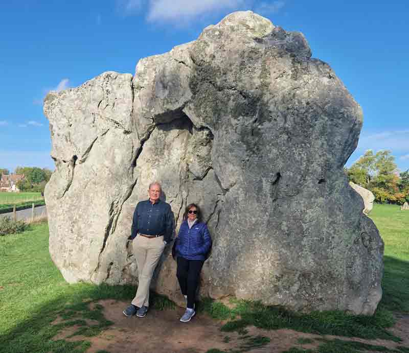 Tour guests by the huge Devil's Stone.