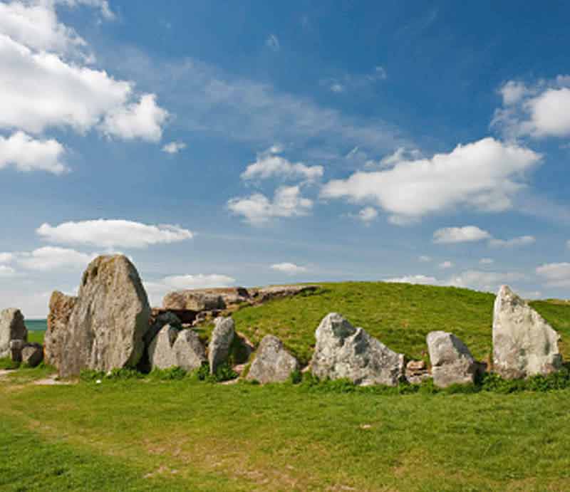 The burial mound with standing stones.