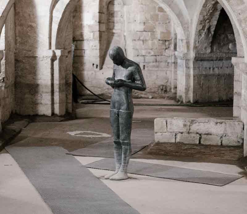 Anthony Gormley sculpture of lead figure in the Crypt.