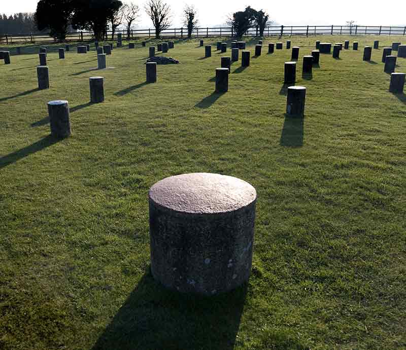 Marker pillars rising from the ground.