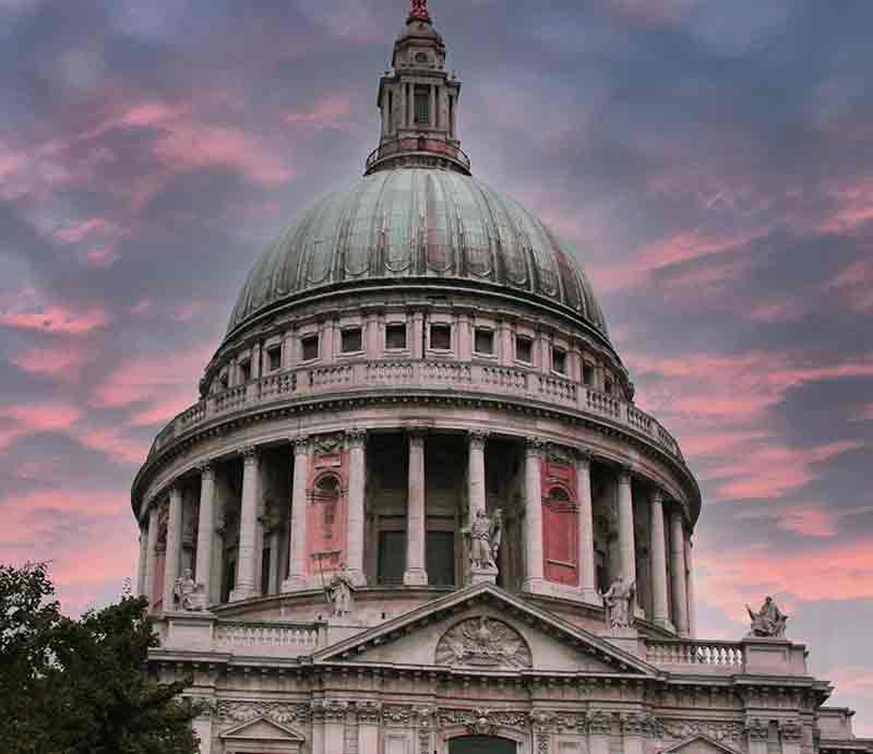 The dome against a pink evening sky.