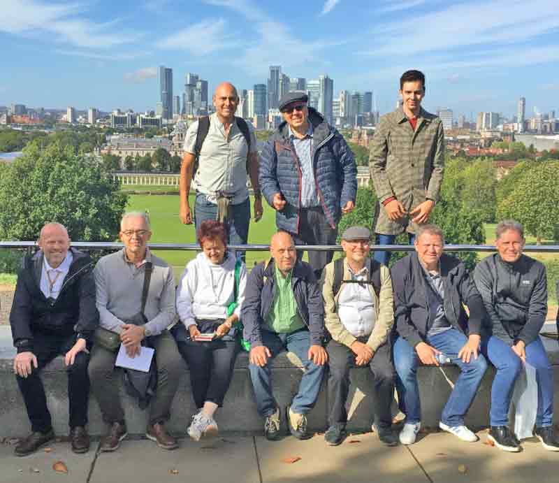 Posing with park and Canary Wharf in the background.