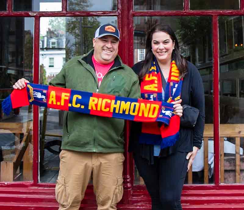 With guests wearing Richmond FC scarves.