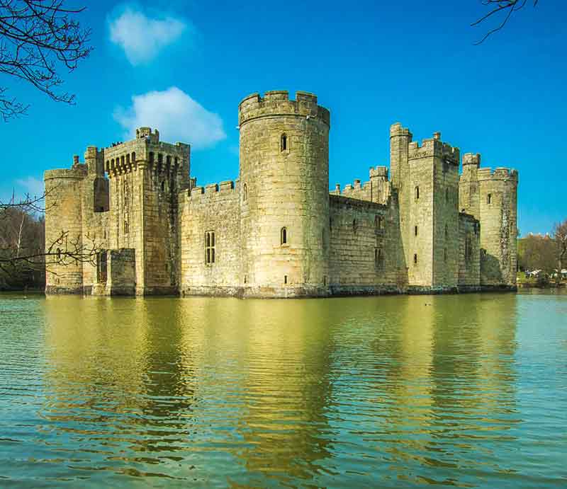 Bodiam Castle reflected in the lake..