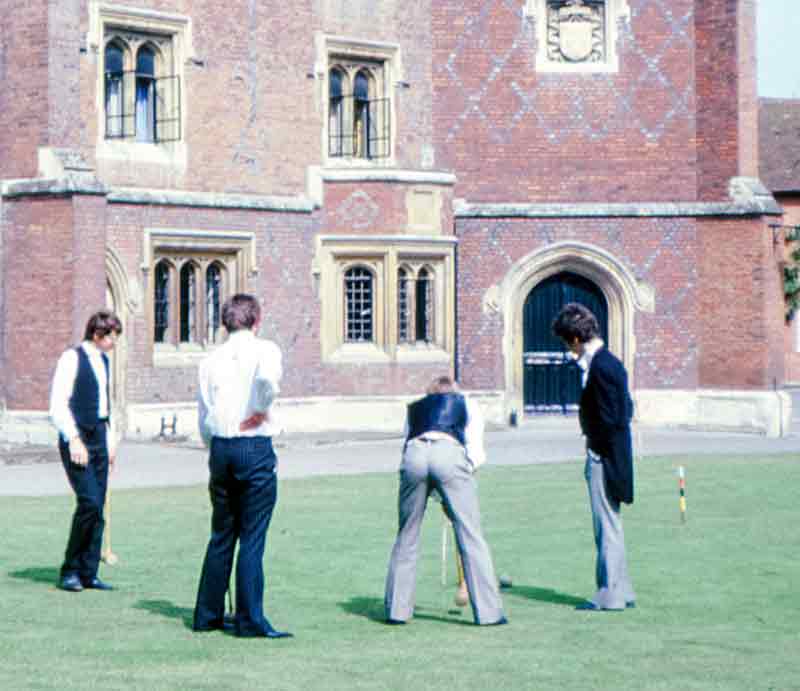 Etonians playing croquet on the lawn.
