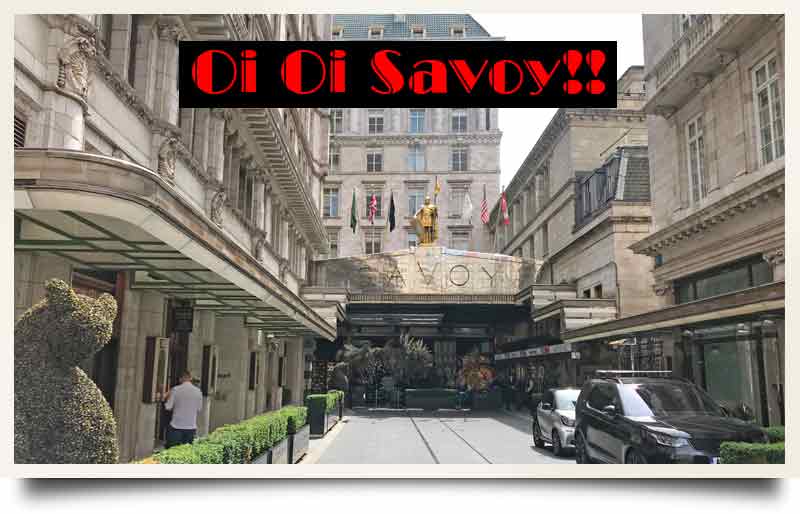 Entrance to the building with caption 'Oi Oi Savoy' in an art deco font.