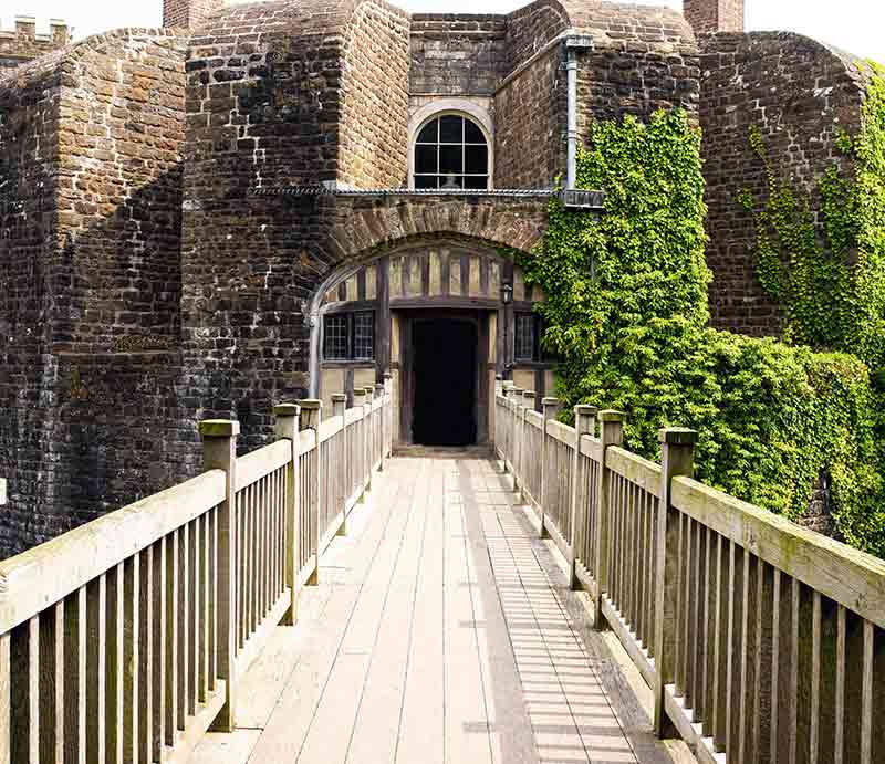 The wooden footbridge leading to the castle entrance..